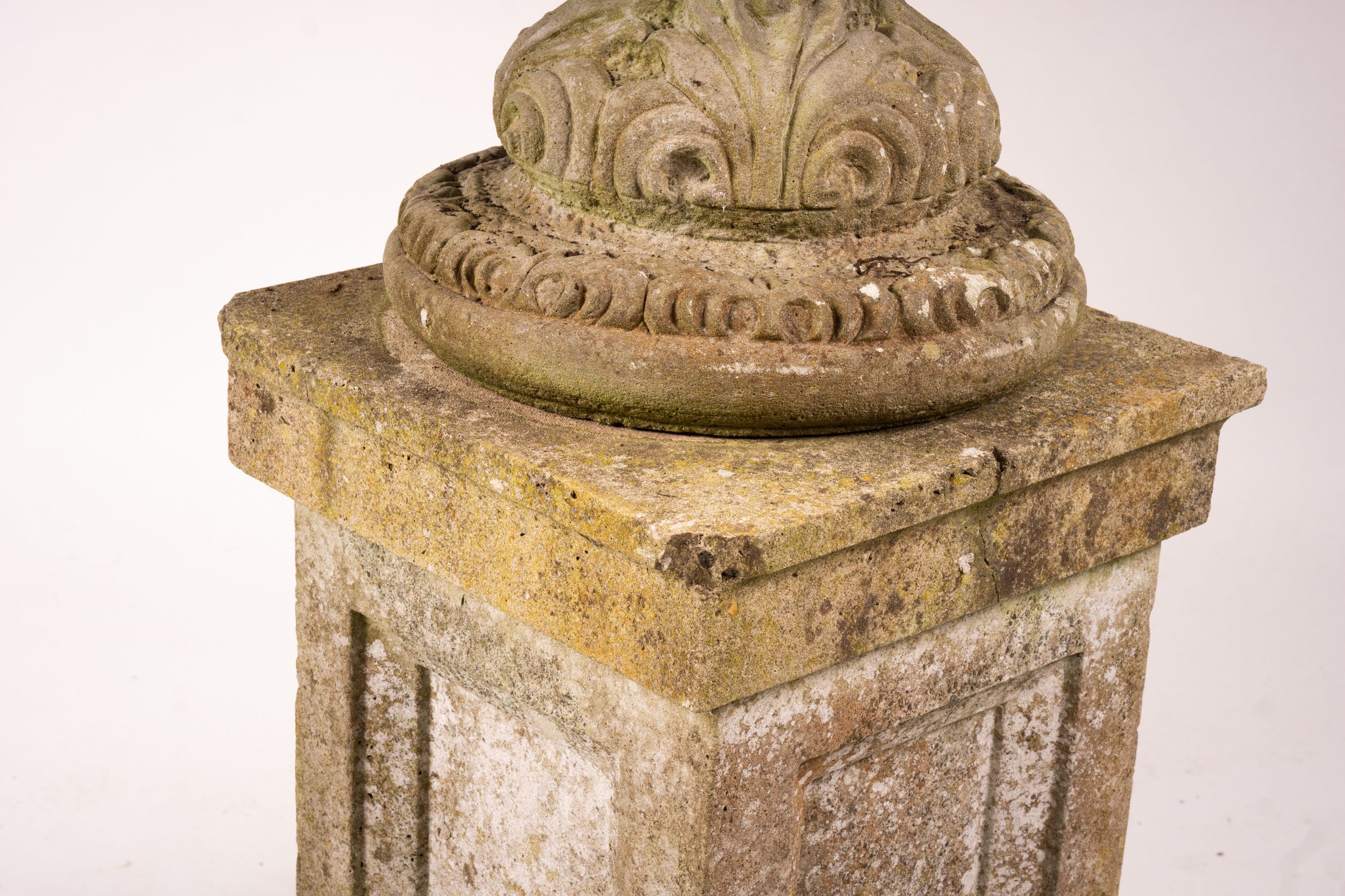 A pair of reconstituted stone circular garden planters on pedestal bases, diameter 45cm, height 110cm